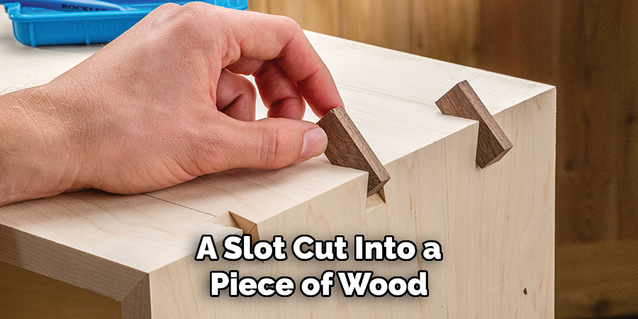 A Slot Cut Into a Piece of Wood