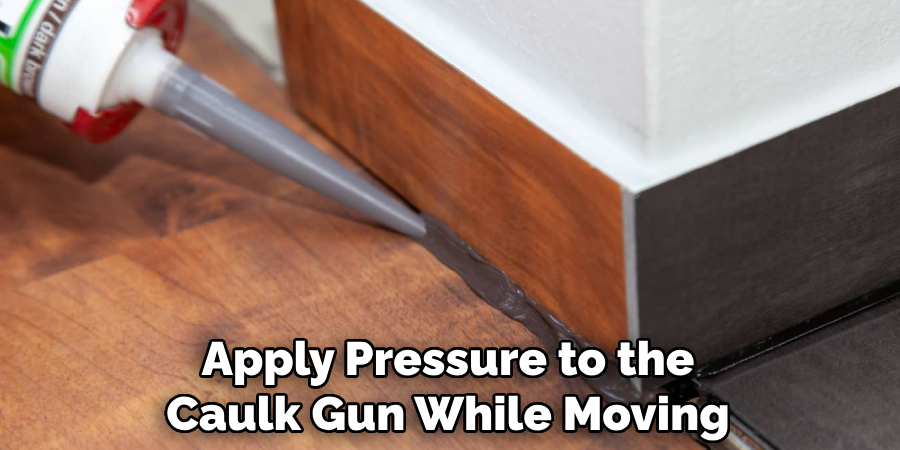 Apply Pressure to the Caulk Gun While Moving