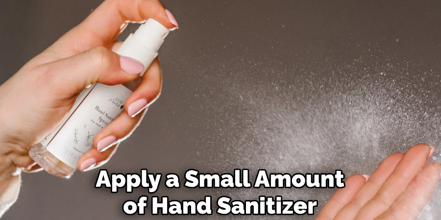 Apply a Small Amount of Hand Sanitizer