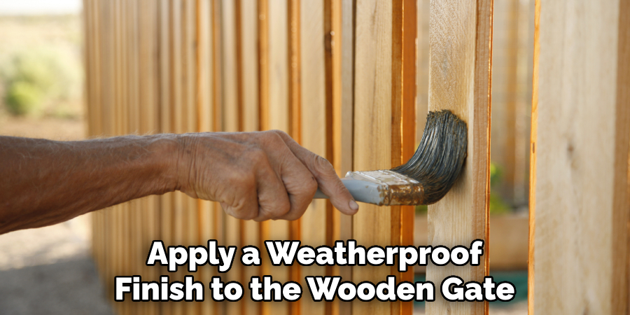 Apply a Weatherproof Finish to the Wooden Gate