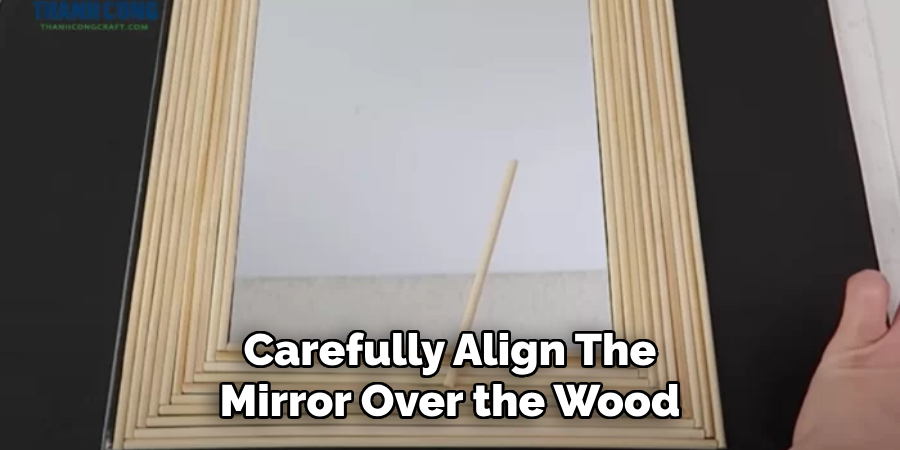 Carefully Align the Mirror Over the Wood