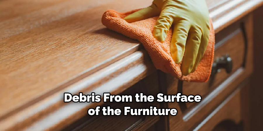 Debris From the Surface of the Furniture