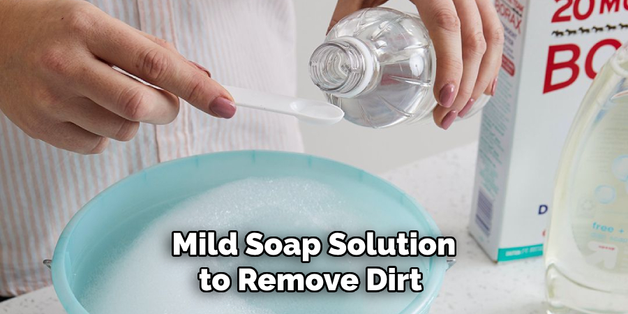 Mild Soap Solution to Remove Dirt