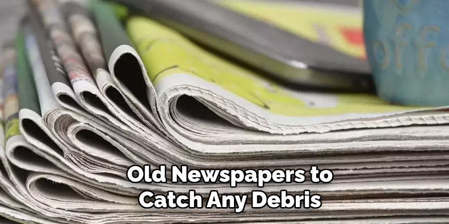 Old Newspapers to Catch Any Debris