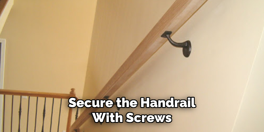 Secure the Handrail With Screws