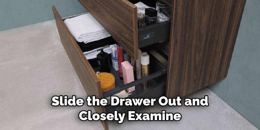 Slide the Drawer Out and Closely Examine