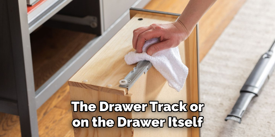 The Drawer Track or on the Drawer Itself