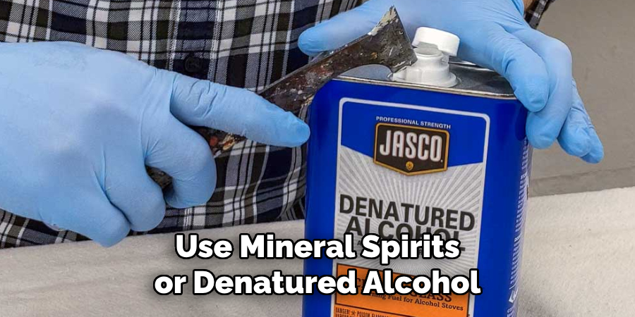 Use Mineral Spirits or Denatured Alcohol