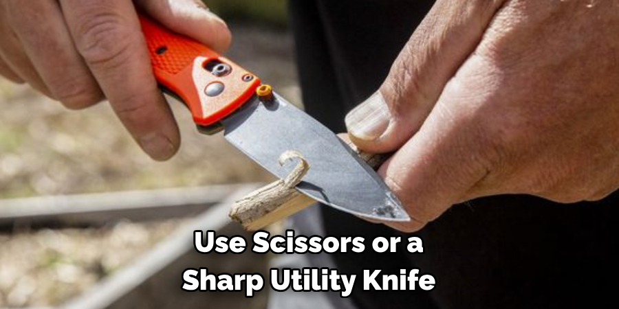 Use Scissors or a Sharp Utility Knife