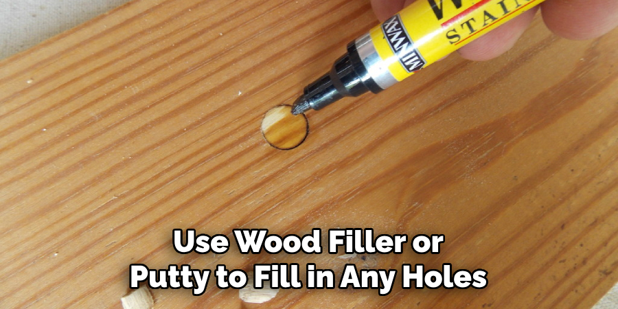 Use Wood Filler or Putty to Fill in Any Holes