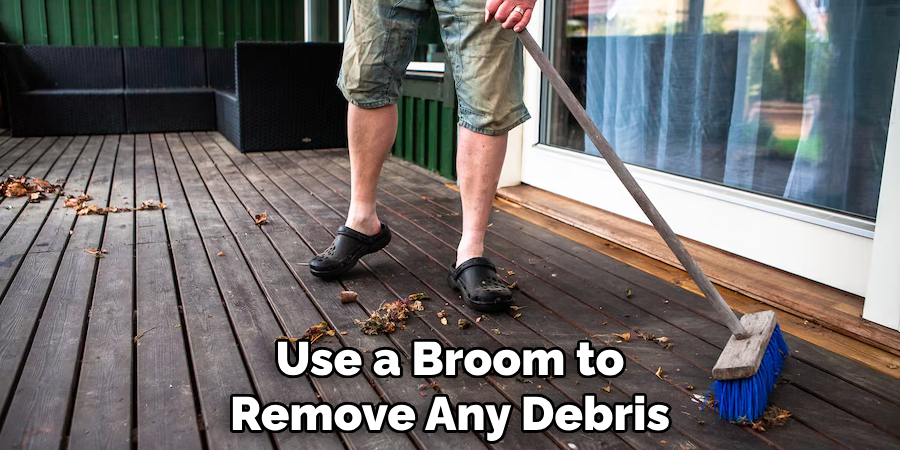 Use a Broom to Remove Any Debris