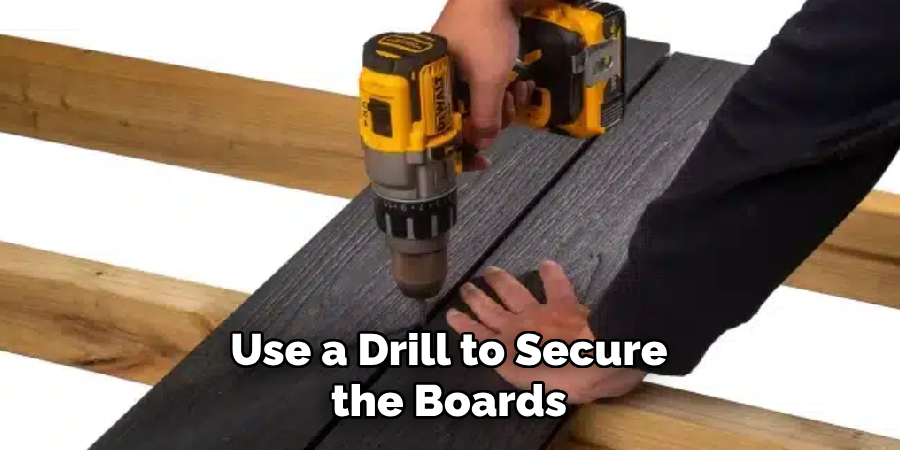 Use a Drill to Secure the Boards