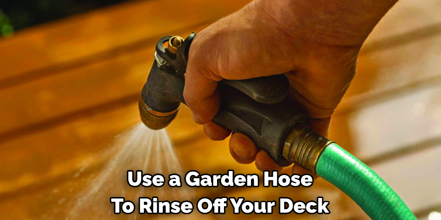 Use a Garden Hose To Rinse Off Your Deck