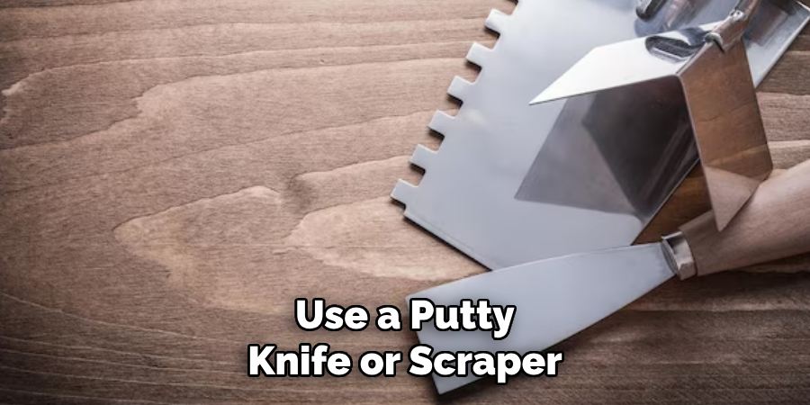 Use a Putty Knife or Scraper