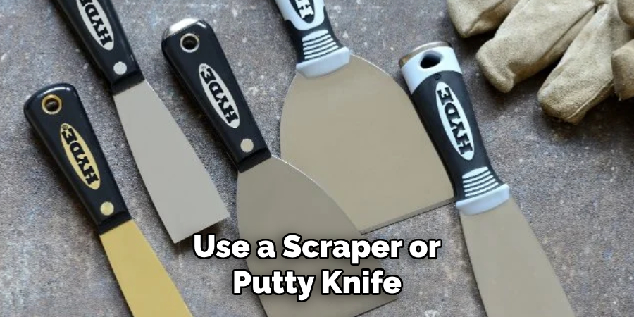 Use a Scraper or Putty Knife