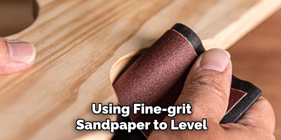 Using Fine-grit Sandpaper to Level