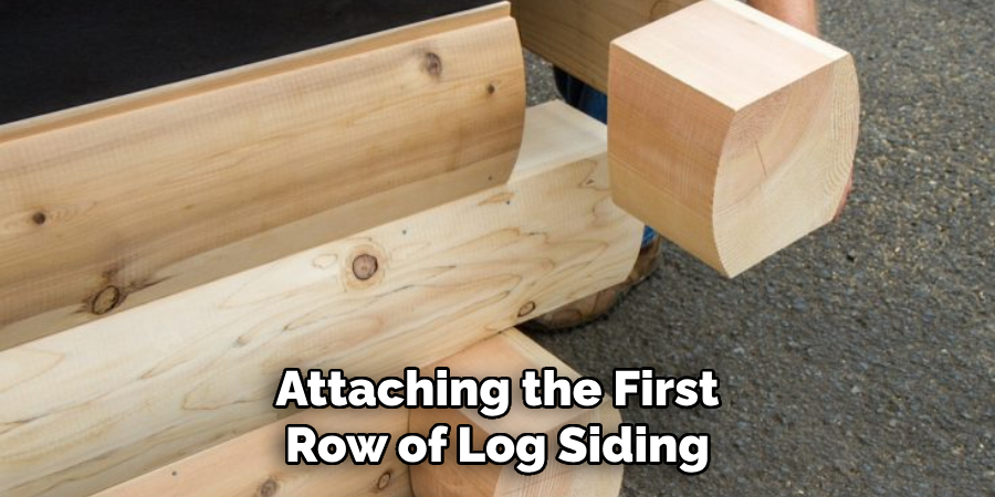 Attaching the First Row of Log Siding