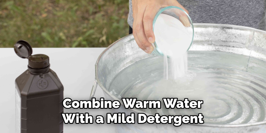 Combine Warm Water With a Mild Detergent