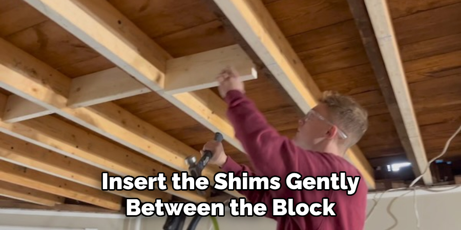 Insert the Shims Gently Between the Block