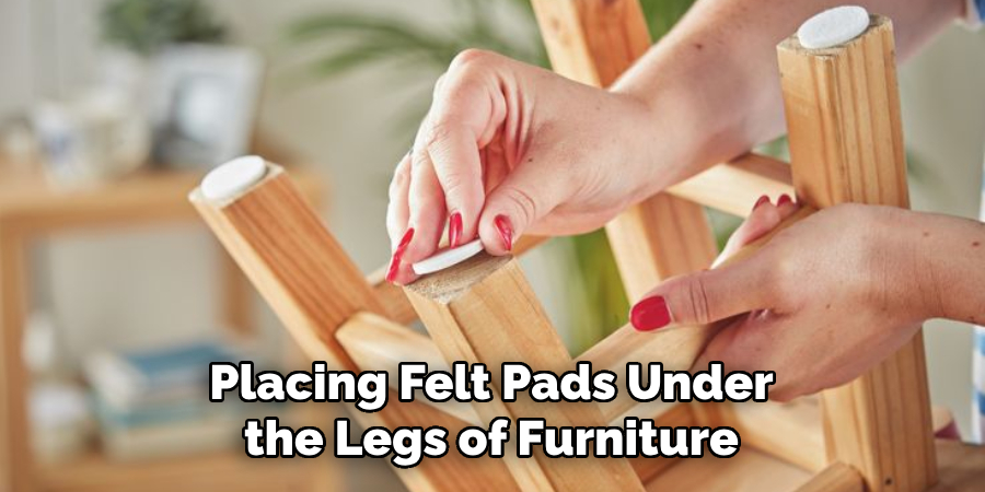 Placing Felt Pads Under the Legs of Furniture