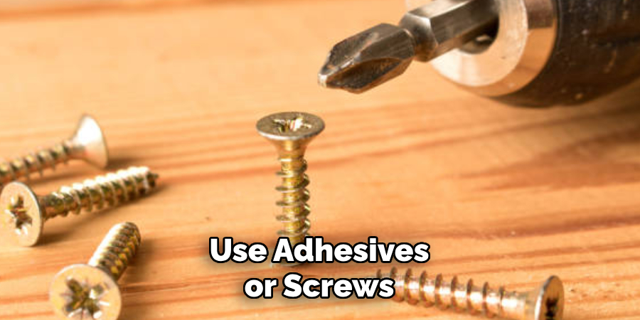 Use Adhesives or Screws