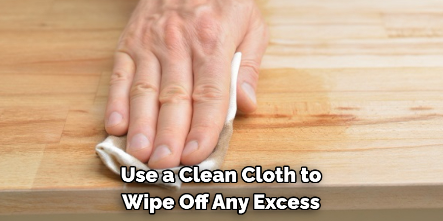 Use a Clean Cloth to Wipe Off Any Excess