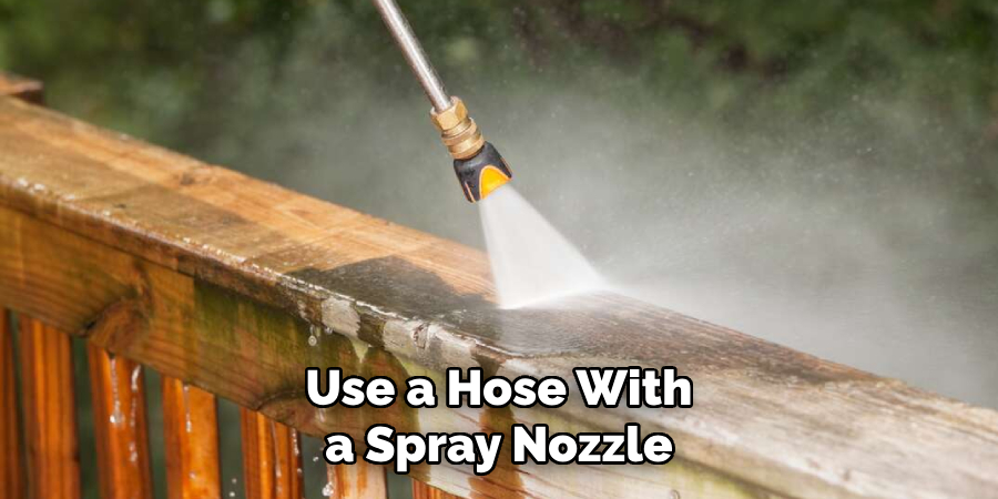 Use a Hose With a Spray Nozzle