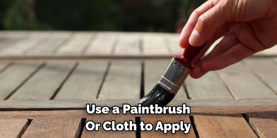 Use a Paintbrush Or Cloth to Apply