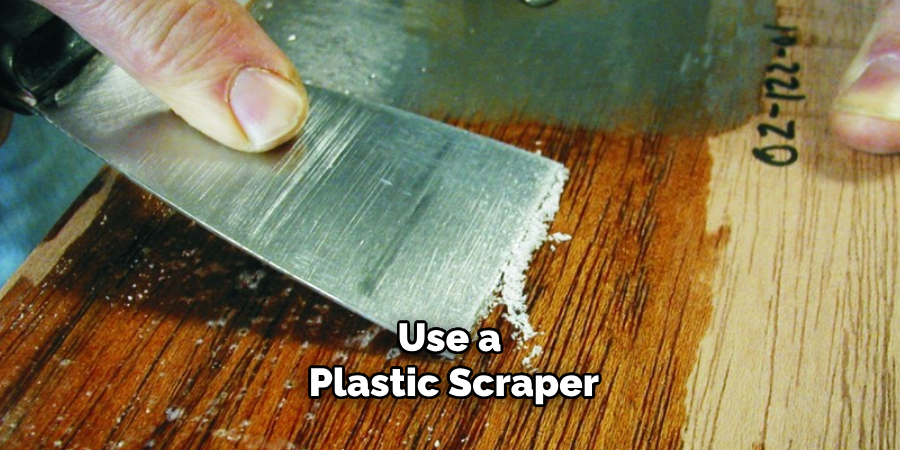 Use a Plastic Scraper