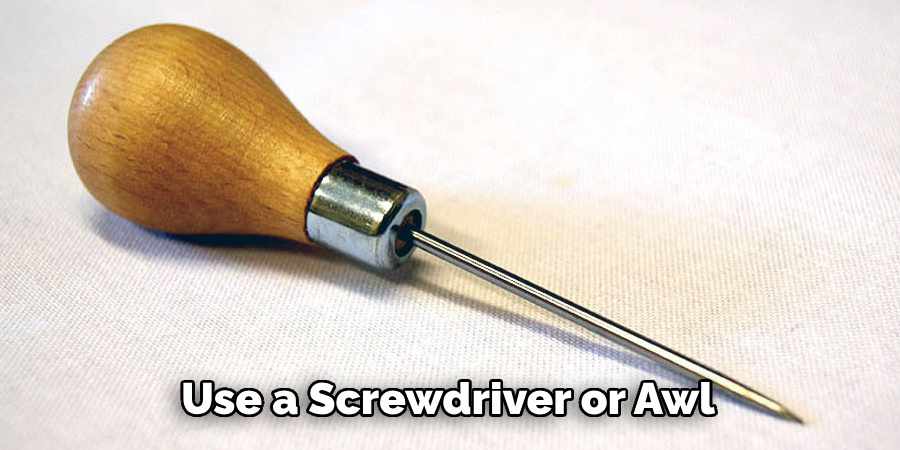 Use a Screwdriver or Awl