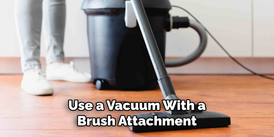 Use a Vacuum With a Brush Attachment