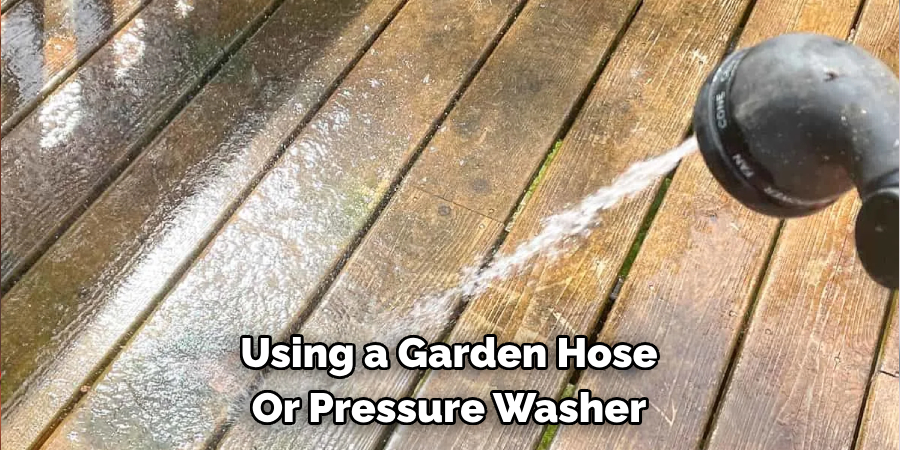 Using a Garden Hose Or Pressure Washer 