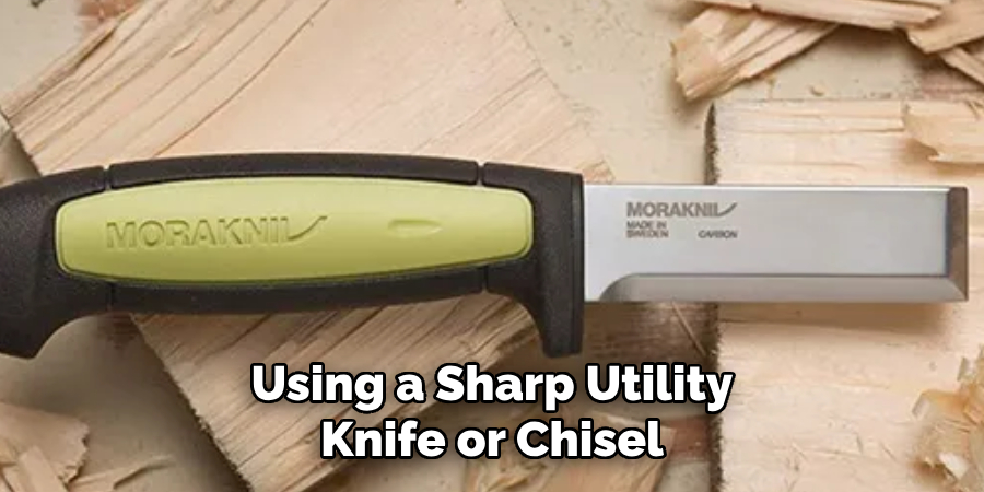 Using a Sharp Utility Knife or Chisel