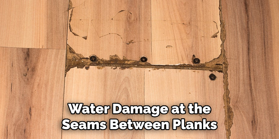 Water Damage at the Seams Between Planks