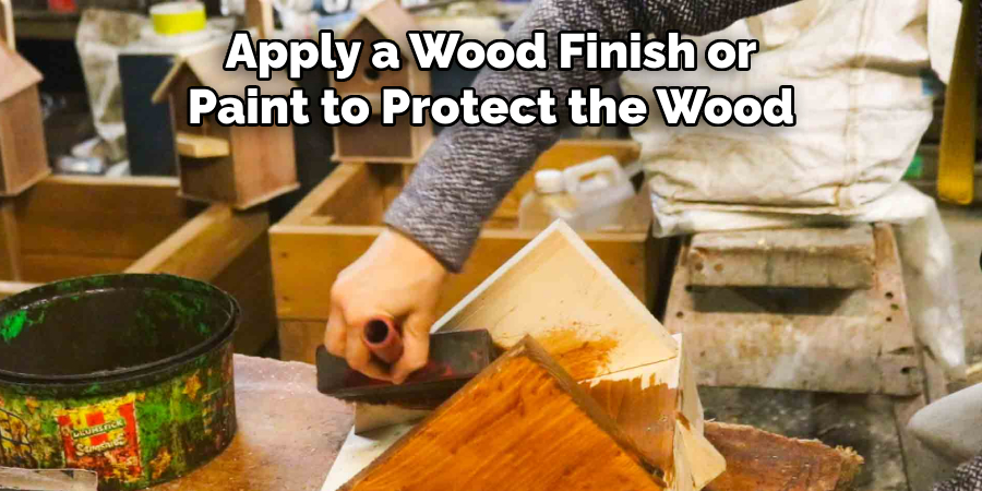 Apply a Wood Finish or Paint to Protect the Wood