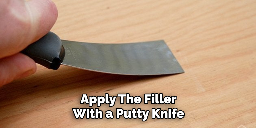 Apply the Filler With a Putty Knife