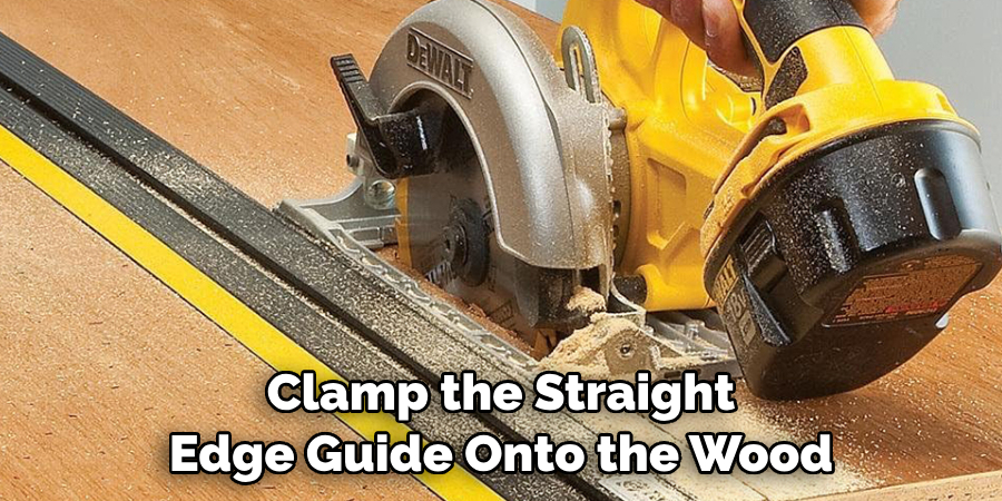 Clamp the Straight Edge Guide Onto the Wood