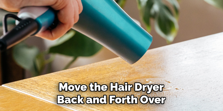 Move the Hair Dryer Back and Forth Over