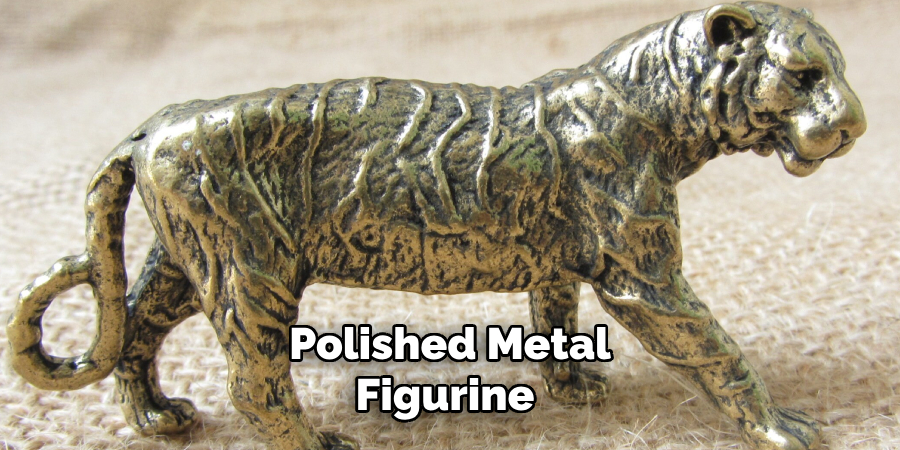 Polished Metal Figurine 