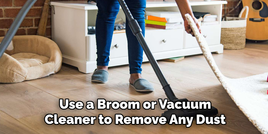 Use a Broom or Vacuum Cleaner to Remove Any Dust