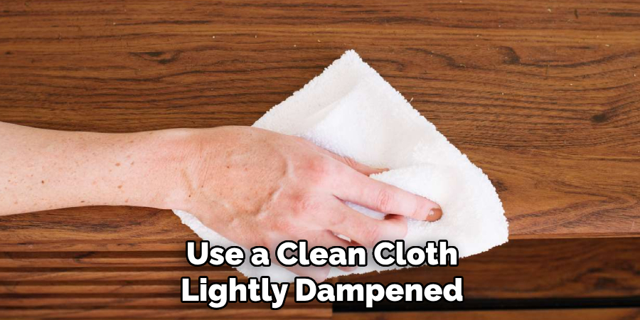 Use a Clean Cloth Lightly Dampened