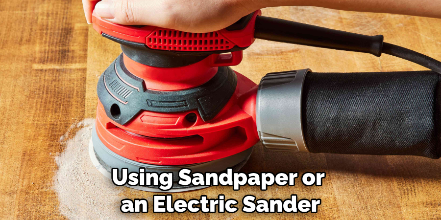 Using Sandpaper or an Electric Sander