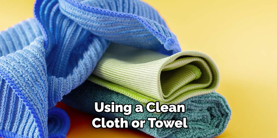 Using a Clean Cloth or Towel