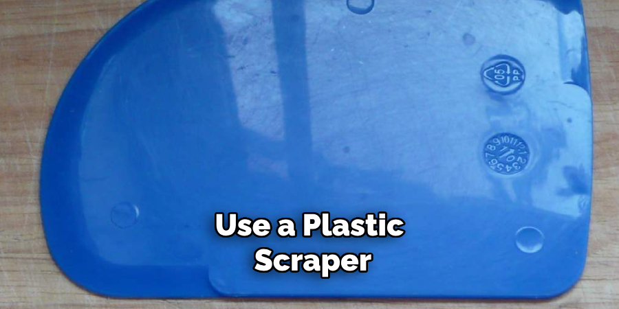 Use a Plastic Scraper