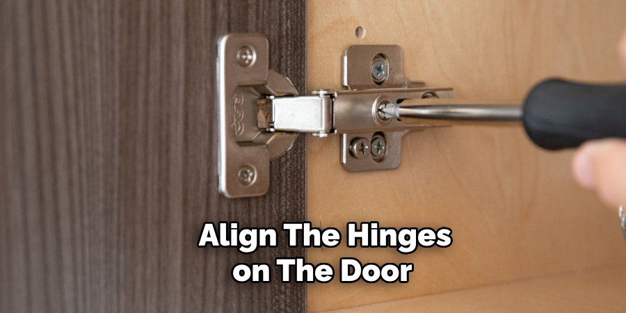 Align the Hinges on the Door