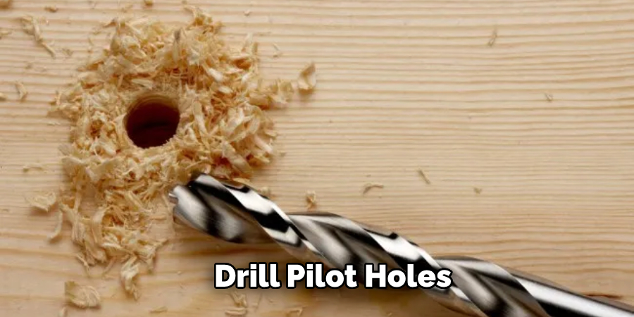 Drill Pilot Holes