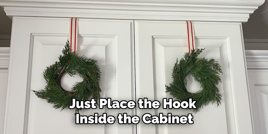 Just Place the Hook
Inside the Cabinet