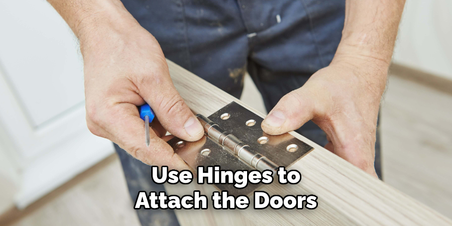 Use Hinges to
Attach the Doors