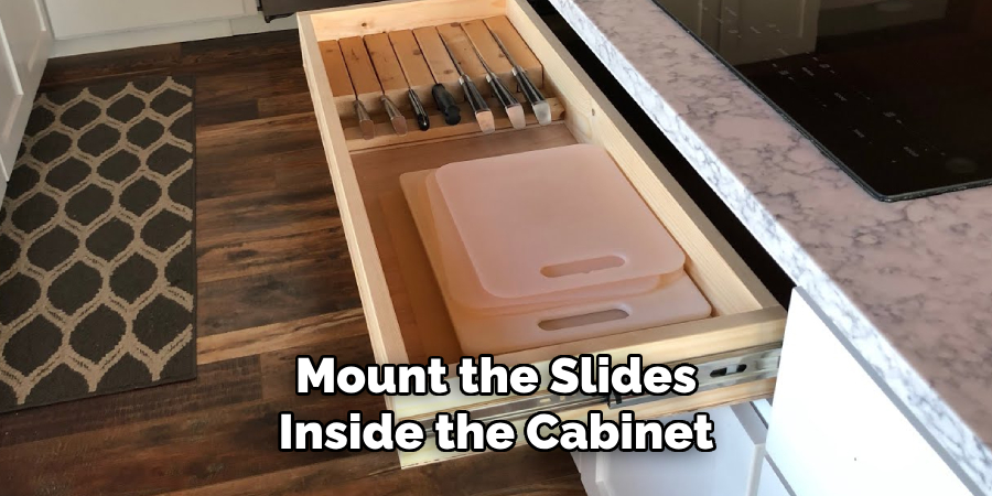 Mount the Slides 
Inside the Cabinet