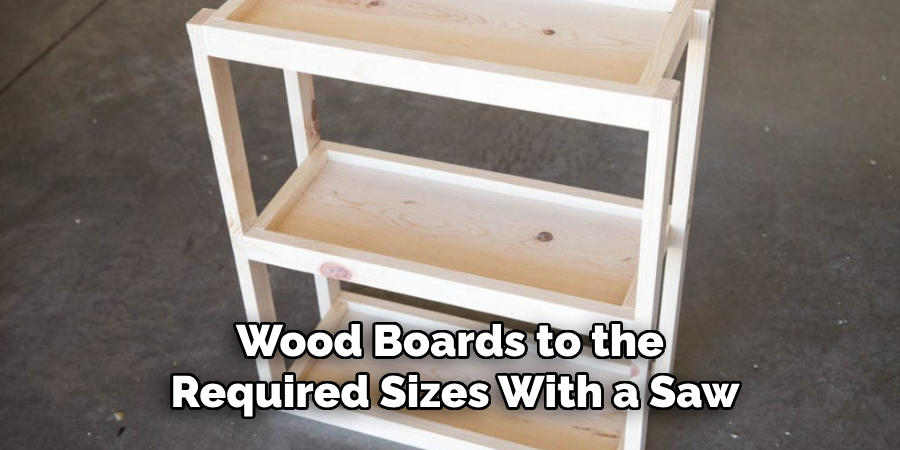  Wood Boards to the
 Required Sizes With a Saw